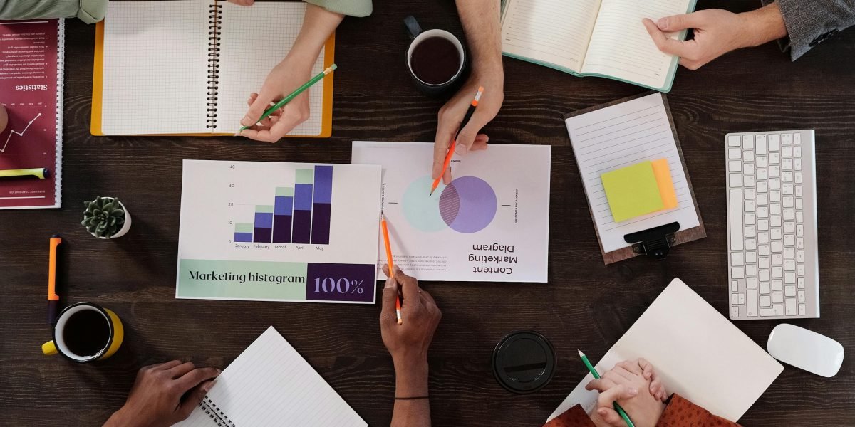A team of marketing professionals discusses the importance of authenticity in influencer content, comparing celebrity endorsements to micro-influencers.