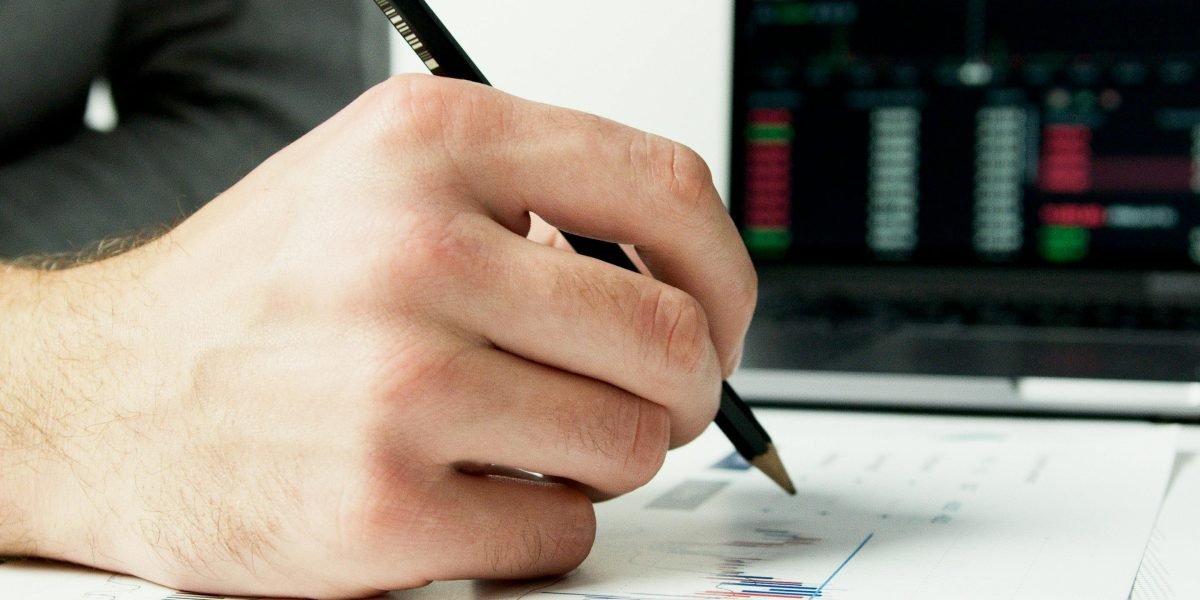 A professional reviewing data on a dashboard, identifying trends and making data-driven decisions for optimization.