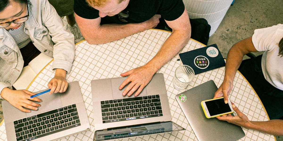 Professionals collaborating to leverage AI tools for optimizing their marketing strategies.