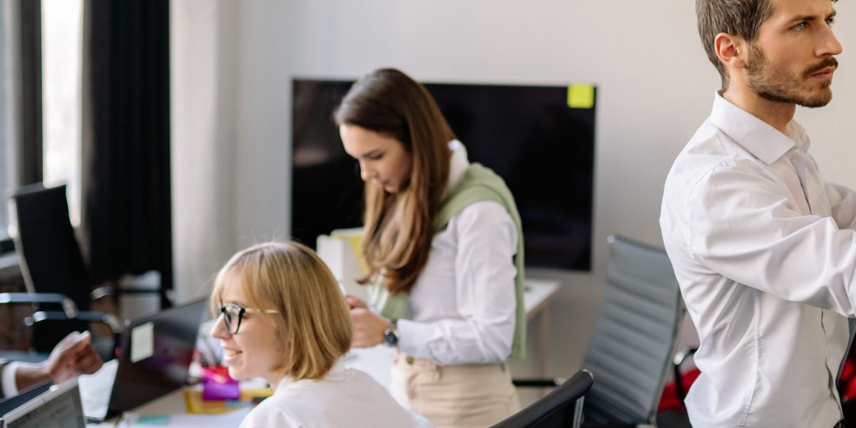 Marketing professionals discussing complex strategies and new opportunities in a fast-paced environment.