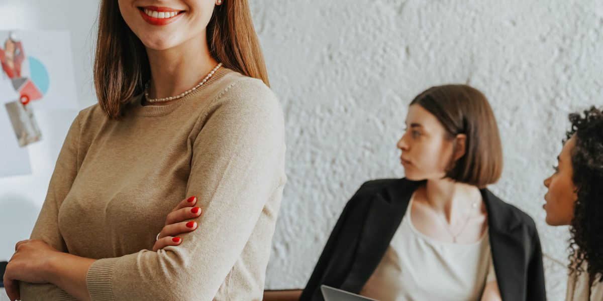 A leader confidently presenting successful marketing campaign results to a receptive audience.