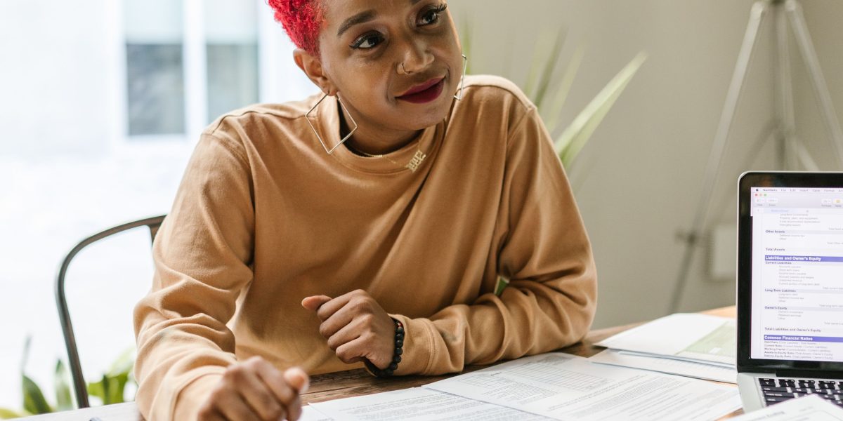 A small business owner discusses digital marketing service packages and pricing models with an agency consultant.
