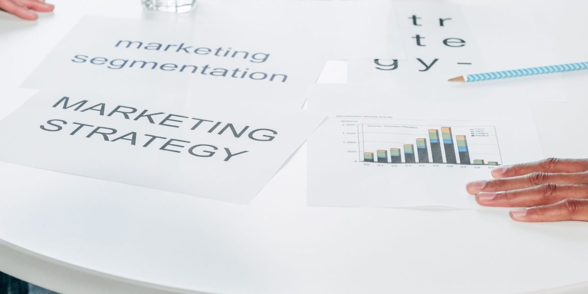A team collaborates on a marketing strategy, aligning efforts to promote products and services.