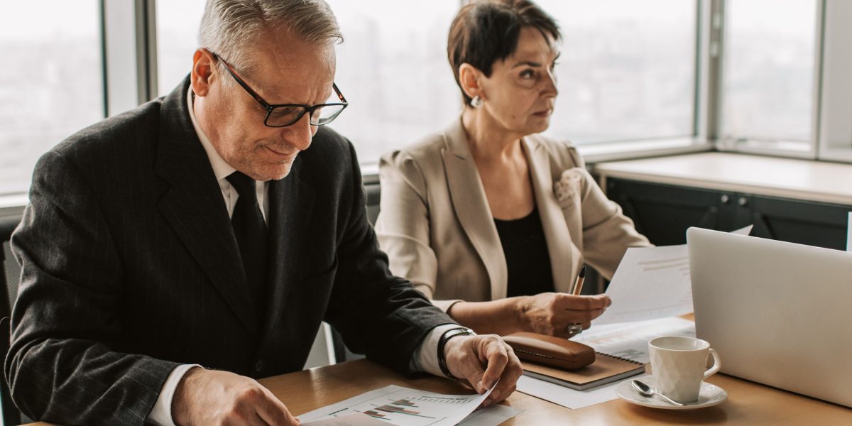 A business executive confidently presenting a strategic roadmap, outlining future plans to a team or stakeholders.